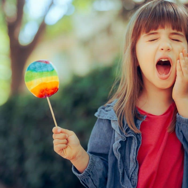 Little Girl Experiencing A Toothache Dental Emergency