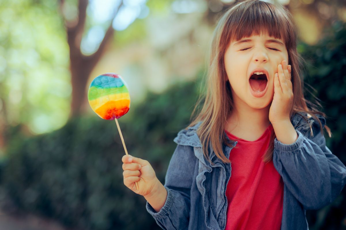 Little Girl Experiencing A Toothache Dental Emergency
